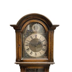 English - 20th century oak cased 8-day chiming granddaughter clock with a break arch pediment, fully glazed trunk door on a rectangular plinth raised on bun feet, three train chain driven movement with Westminster, Whittington and St Michael chimes on the quarters and hours, movement with 12 gong rods. With three brass cased weights, no pendulum.