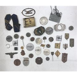 Collection of military badges, buttons, German buckle, pair of Voigtlander  binoculars 6x30 and a WWI bayonet
