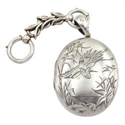 late 19th/early 20th century silver locket, with bright cut bird decoration, the reverse monogrammed 'RC', London assay mark