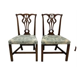 Pair George III mahogany dining chairs, the shaped cresting rail over pierced splat, upholstered seat raised on square chamfered supports