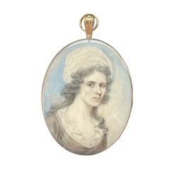 Late 18th century English school oval miniature head and shoulders portrait on ivory of a lady wearing a turban in gilt frame 6cm x 5cm