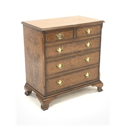 Late 20th century figured walnut chest fitted with two short and three long drawers, raised on ogee bracket feet, W81cm, H85cm, D46cm