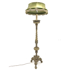  Early 20th century gilt bronze two branch standard lamp, column decorated with water leaves, raised on three ball and claw supports, with decorative shade, H177cm  