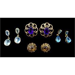 Four pairs of  9ct gold stud earrings including amethyst, smokey quartz and blue topaz
