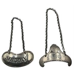 Two George III silver decanter labels by Hester Bateman, one of curved scroll form incised 'Claret' with raised pediment engraved with a crest, within a bright cut border and the other kidney shaped with pierced title 'Sherry', L5cm, no date marks (2)