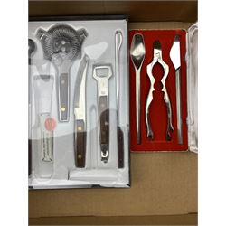 German part service of stainless steel cutlery by Grasoli to include knives and forks, fish knives and forks, spoons, carving set, cocktail set, ladle etc, together with other vintage cutlery sets including Asni Denmark Stainless steel and teak salad servers, two Hardanger Tinn serving spoons, together with other similar cutlery sets 
