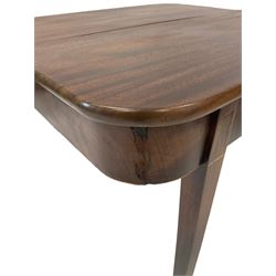 Mahogany fold over table, raised on square tapering supports 