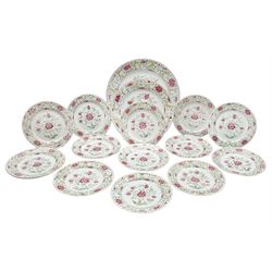 18th century Chinese Export Famille Rose porcelain fifteen-piece table service, each enamelled and gilded with Peonies within a comprising two graduated circular dishes, D38.5cm (max) and thirteen plates, D23cm (15)

