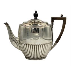 Late Victorian silver oval teapot with ebonised handle and lift, half body reeded decoration, presentation inscription 'Ashbourne Shire Horse Society 1893 for Best Foal' Sheffield 1893 Maker Atkin Bros.