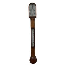 Late 19th century walnut boxwood cistern stick barometer with a double canted register and weather predictions, measuring barometric air pressure from 27 to 31 inches, arched glazed top and rectangular trunk, with twin vernier setting discs above a mercury Fahrenheit and Celsius scale thermometer, the rounded base with a circular moulded cistern cover.