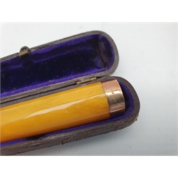 Amber cheroot holder with 9ct gold band, cased, pair of small Victorian silver shoe buckles Chester 1897 Maker Saunders and Hollings, cased set of four sterling silver Bridge pencils and a pencil by Wilmot & Co.