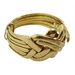 Gold puzzle ring stamped 18K, approx 12.4gm