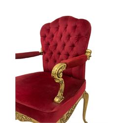 Pair mid-to late 20th century gilt metal elbow chairs, foliate scroll cast frame decorated with shells, upholstered in buttoned red fabric, on cabriole supports