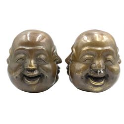 Two Chinese bronzed four-faced Buddha heads, H12cm