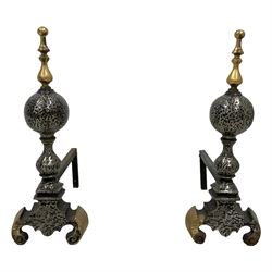 Pair cast iron and wrought metal andirons, globular form with finials, on scrolled feet