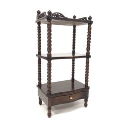 Victorian style mahogany three tier serpentine front what-not, three quarter galleried top with pierced and carved acanthus decoration, rope twist and turned supports, drawer to base 