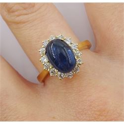 18ct gold cabochon sapphire and diamond cluster ring, hallmarked, sapphire approx 4.30 carat, total diamond weight approx 0.60 carat