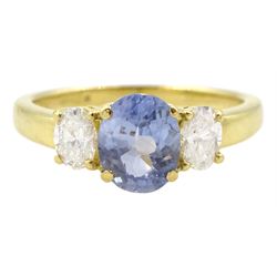 18ct gold three stone oval cut sapphire and oval cut diamond ring, stamped 750, sapphire approx 0.95 carat, total diamond weight approx 0.40 carat