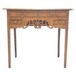 Late Georgian oak lowboy, the top and three drawers with mahogany bands and chequered string inlay, shaped apron with pierced fretwork decoration, raised on square tapered and chamfered supports 86cm x 50cm, H77cm