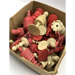 Collection of 19th century turned ivory and bone chess pieces in plain and red stained, incomplete sets
