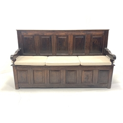 18th century and later joined oak hall settle, with panelled back and front, hinged seat, shaped arm rests and raised on stile supports, W180cm, H106cm, D49cm