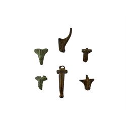 Roman British - Roman copper alloy headstud brooch complete with pin, decorated with horizontal grooves or lozenges, together with five headstud brooch fragments, all circa 1-200 AD (6)