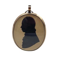 19th century painted oval silhouette of a gentleman, head and shoulders in gilt frame 7.5 x 6cm with hair panel to the reverse