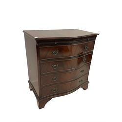 Georgian design mahogany bachelors chest, the serpentine top over brush slide and four cock-beaded drawers, raised on bracket supports 