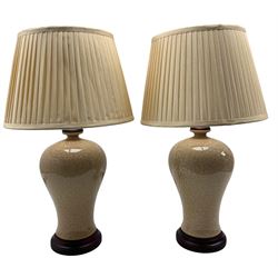Pair of Chinese crackle glaze table lamps, each of baluster form, raised upon circular hardwood base, including shade H60cm