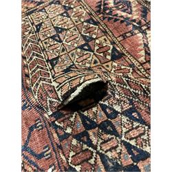 Tekki bukhara red rug with overall geometric design, together with another rug of geometric design 