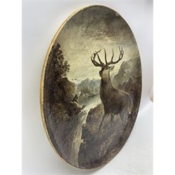 Large Victorian Copeland hand painted earthenware charger depicting a Stag on a hillside overlooking a loch, mountains beyond, by William Yale, impressed Copeland and painted No.74, D56cm. Note: Yale worked as a painter for Copeland between 1869 to 1883, before establishing his own tile manufacturing and painting factory in Liverpool Road, Stoke on Trent in 1893, where he produced hand painted tiles in reaction to the mass produced and transfer decorated tiles of the day