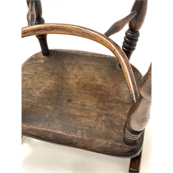 Set four early to mid 19th century elm and ash Windsor armchairs, having hoop, spindle and pierced splat backs over shaped seats and raised on ring turned supports united by crinoline stretcher