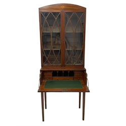 Edwardian inlaid mahogany secretaire bookcase, the arched top with inlaid shell motif over two doors, the doors with curved and intersecting astragal glazing, fall front secretaire drawer fitted with small drawers, pigeon holes and inlaid writing surface, square tapering supports with fan inlaid corner brackets, satinwood banding and boxwood stringing throughout 