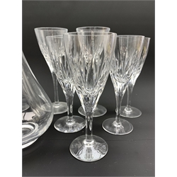 Part suite of Stuart Crystal Lichfield pattern glass comprising four large claret glasses and seven smaller and a Stuart crystal Ariel pattern decanter 
