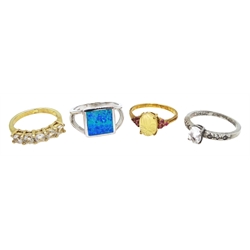 Four silver and silver-gilt dress rings, all stamped 925