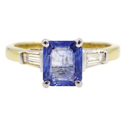 18ct gold three stone Ceylon sapphire and tapered baguette cut diamond ring, stamped 750, sapphire approx 1.85 carat