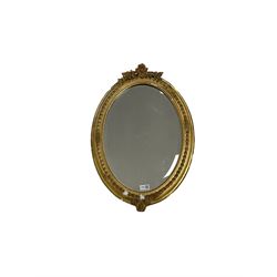 Oval gilt framed mirror by D.B Murray H66cm 