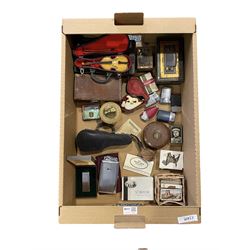 Collection of smoking paraphernalia including a complete box of Sobranie cigarettes, pipes, table lighter, other lighters, cigarette cards etc together with two miniature violins in cases, cash boxes etc in one box