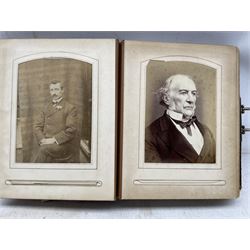 Leather photograph album and contents including military portrait by J Raucher, Swaziland, North West Frontier 1920, portraits by Avison, York etc