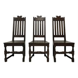 Set six 17th century design oak dining chairs, shaped cresting rail over vertical slat back, plank seat on turned supports joined by turned and plain stretchers 