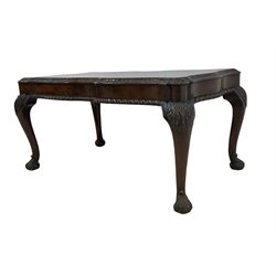 Queen Anne design figured walnut coffee table, shaped top with foliate carved moulded edge, gadrooned lower edge over cabriole supports with acanthus carved scroll feet