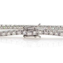 White gold round brilliant cut diamond line bracelet, stamped 18K, total diamond weight approx 2.50 carat