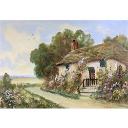 Reginald Daniel Sherrin (British 1891-1971): Thatched Roof Cottages with Spring Flowers, pair watercolours signed together with English School (early 20th century): The Boathouse, oil on board indistinctly signed max 24cm x 36cm (3)