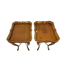 Pair of walnut tray top tables, the fixed tray top over turned supports, terminating in cloven hoof feet W75cm, H67cm, D59cm 