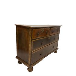 20th century mahogany chest of drawers, the projecting rectangular top over two short and two long oak lined drawers, raised on turned bun feet 