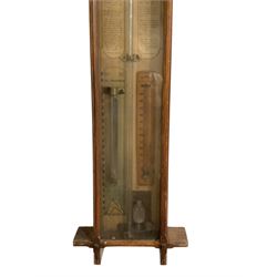 19th century Admiral Fitzroy barometer and a late 19th century two glass wheel barometer.
Fitzroy barometer with original paper scales, storm glass and thermometer, wheel barometer with an oak case and mother of pearl inlay, mercury thermometer and 8