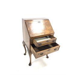 Late 19th century figured walnut bureau de dame, herring bone inlaid sloped fall front revealing fitted interior, over two drawers, raised on cabriole supports W59cm
