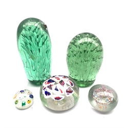Two Victorian glass dump paperweights with bubble inclusions, H15cm a millefiori paperweight and two others (5)