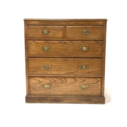 Early 20th century chest fitted with two short and three long graduated drawers, raised on a skirted base 