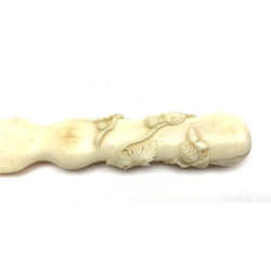 Japanese Meiji period ivory letter opener, the handle carved in high relief with fruiting foliage, L26.5cm 